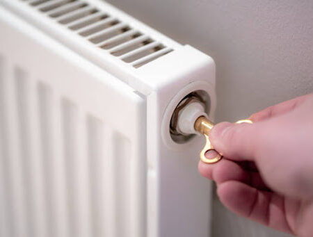 Bleeding a home radiator with a brass key Bleeding a home radiator with a brass key
